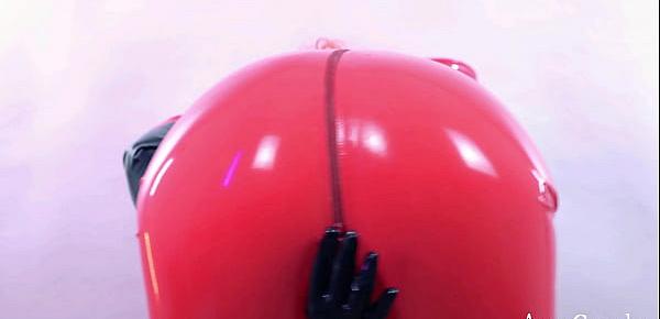 trendsAmazing hot Domme in red latex catsuit teasing close up shiny fetish clothes